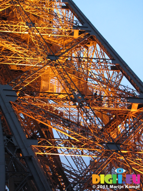 SX18661 Detail of lit up Eiffel tower at dusk